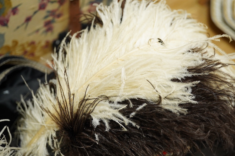 American Order of the Temple uniform, once the property of Theodore Trombly. Condition - coat and hats good, feathers and belt worn, fringed sash good, case worn